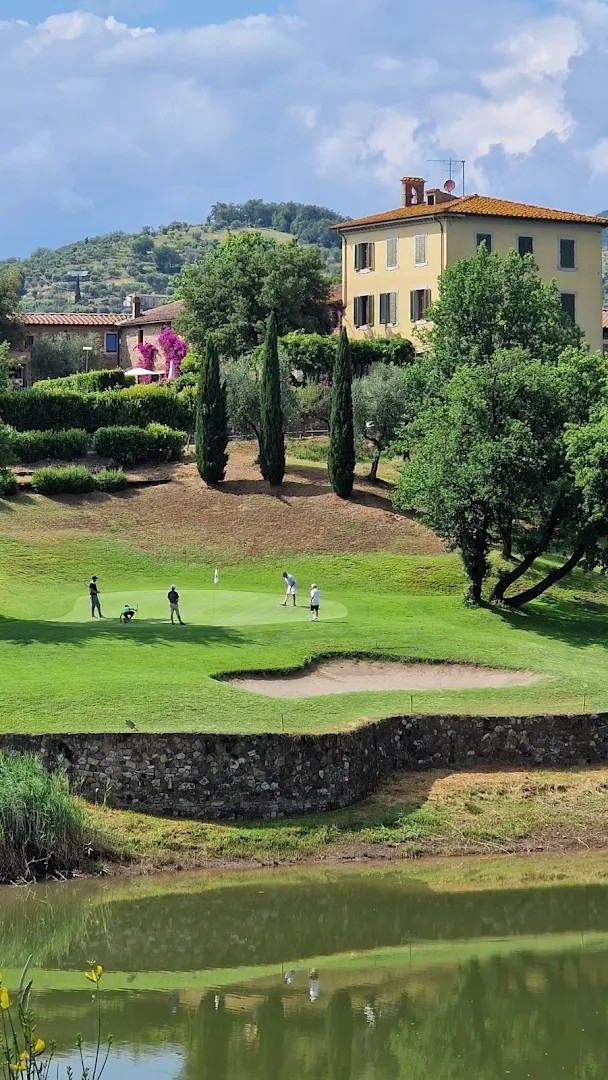 Golf Club Montecatini Terme — green and cypress trees on the course